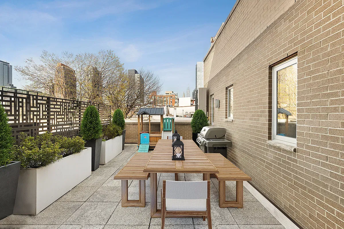 Dining area and planted private terrace at Casa Vizcaya Residence 3E