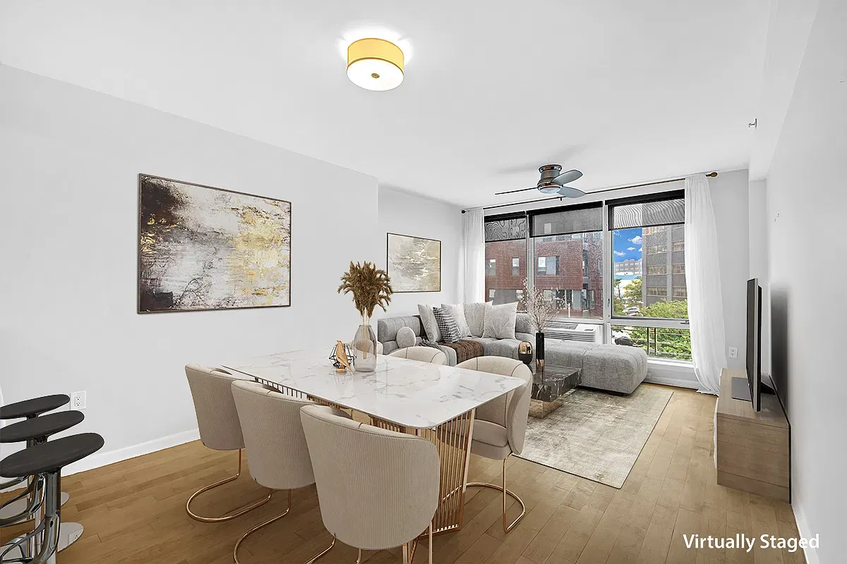 Virtually staged living and dining room at Echelon Residence 4B, 13-11 Jackson Avenue in Long Island City